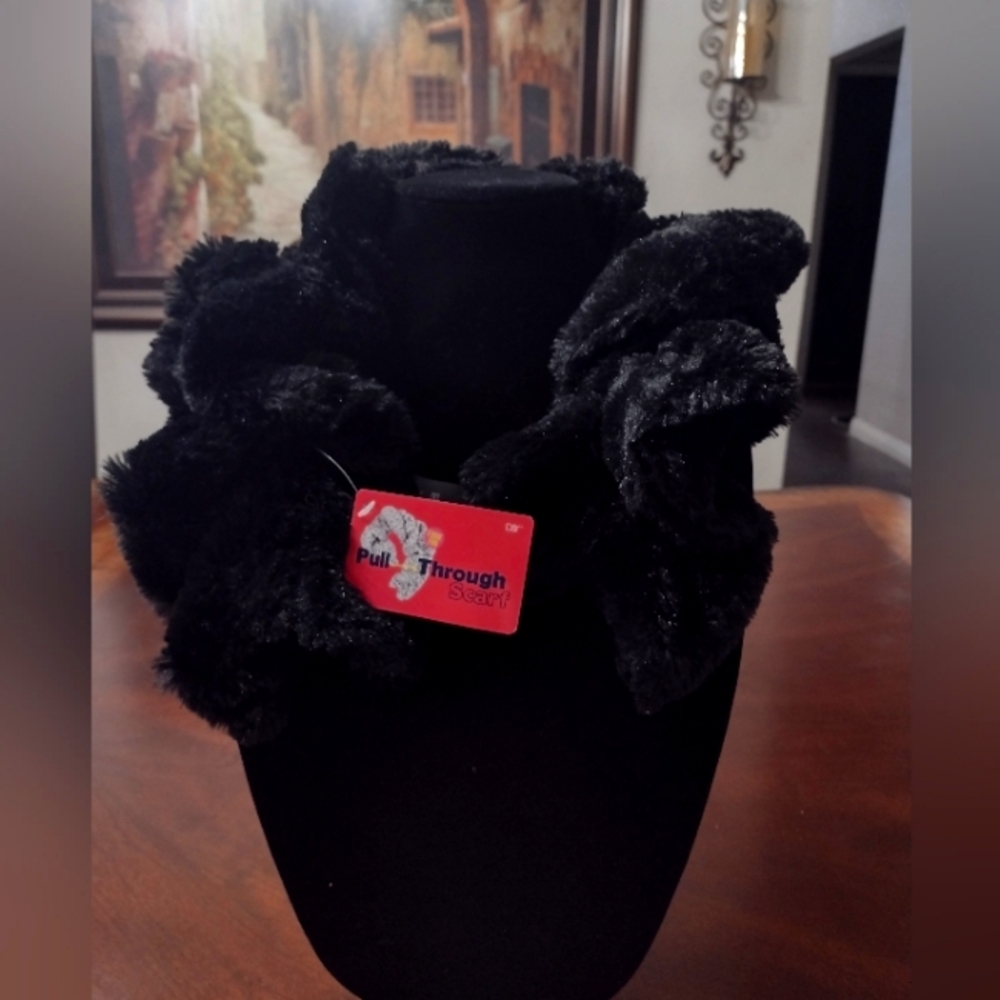 Gorgeous Black Faux Pull Through Scarf. It's furry and beautiful.